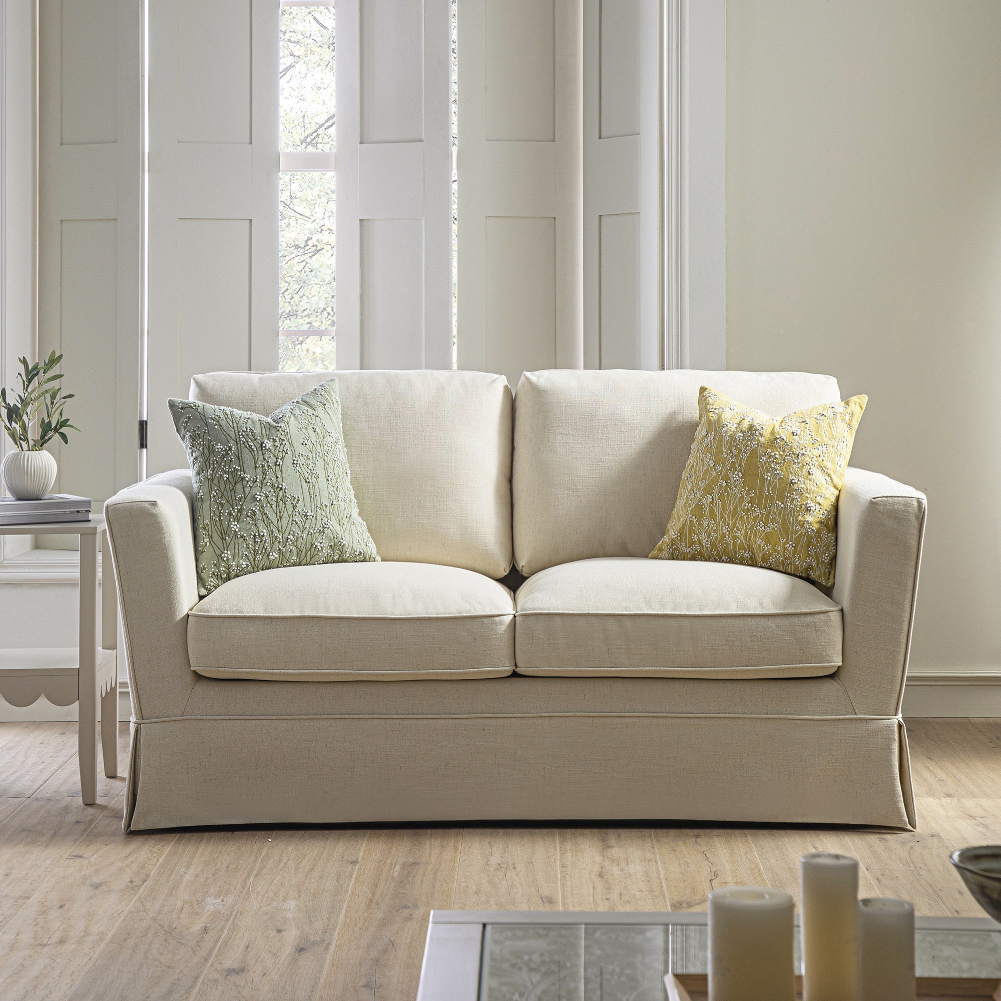 2-Seater Sofa in Oatmeal Linen with Skirted Design