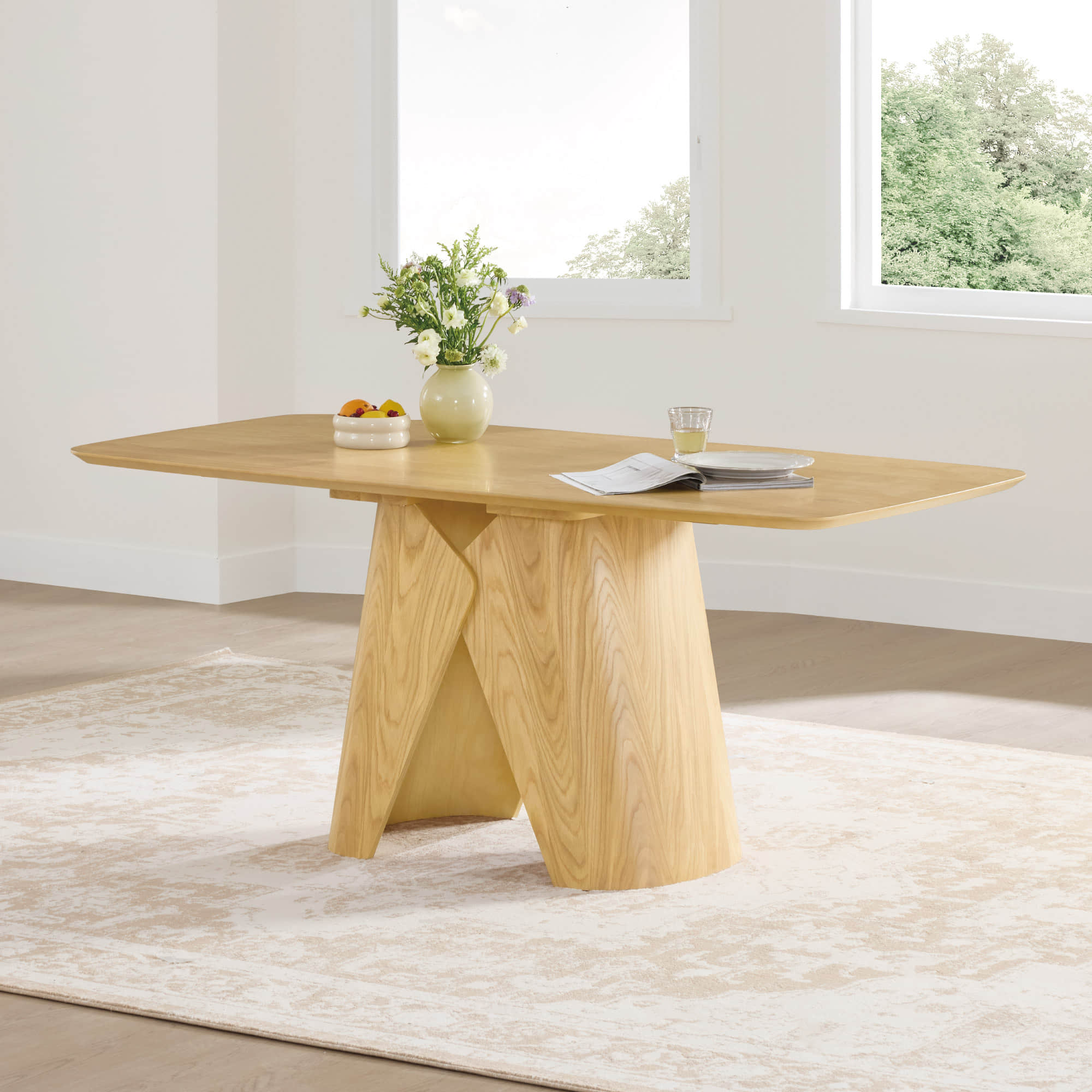 Dining Table with Sculptural Wood Base and Round Top