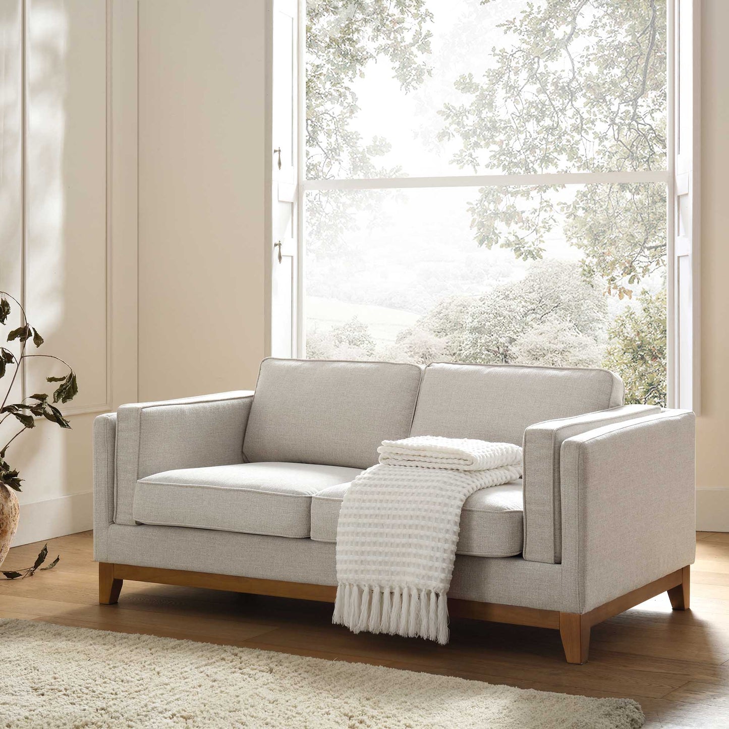 Oatmeal Fabric 2-Seater Sofa with Elegant Cushioning