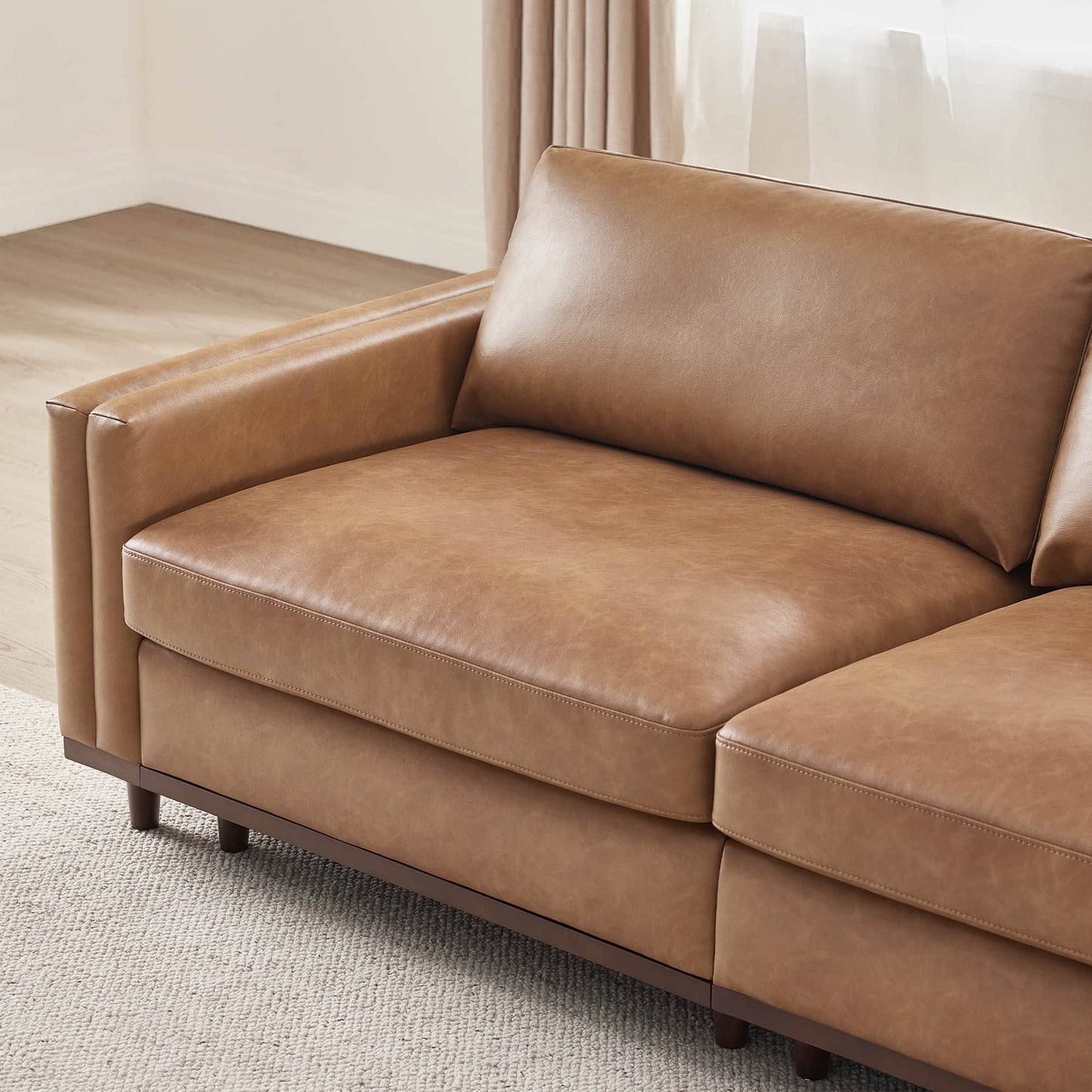 Overstuffed Feather Sectional Sofa with Wood Base