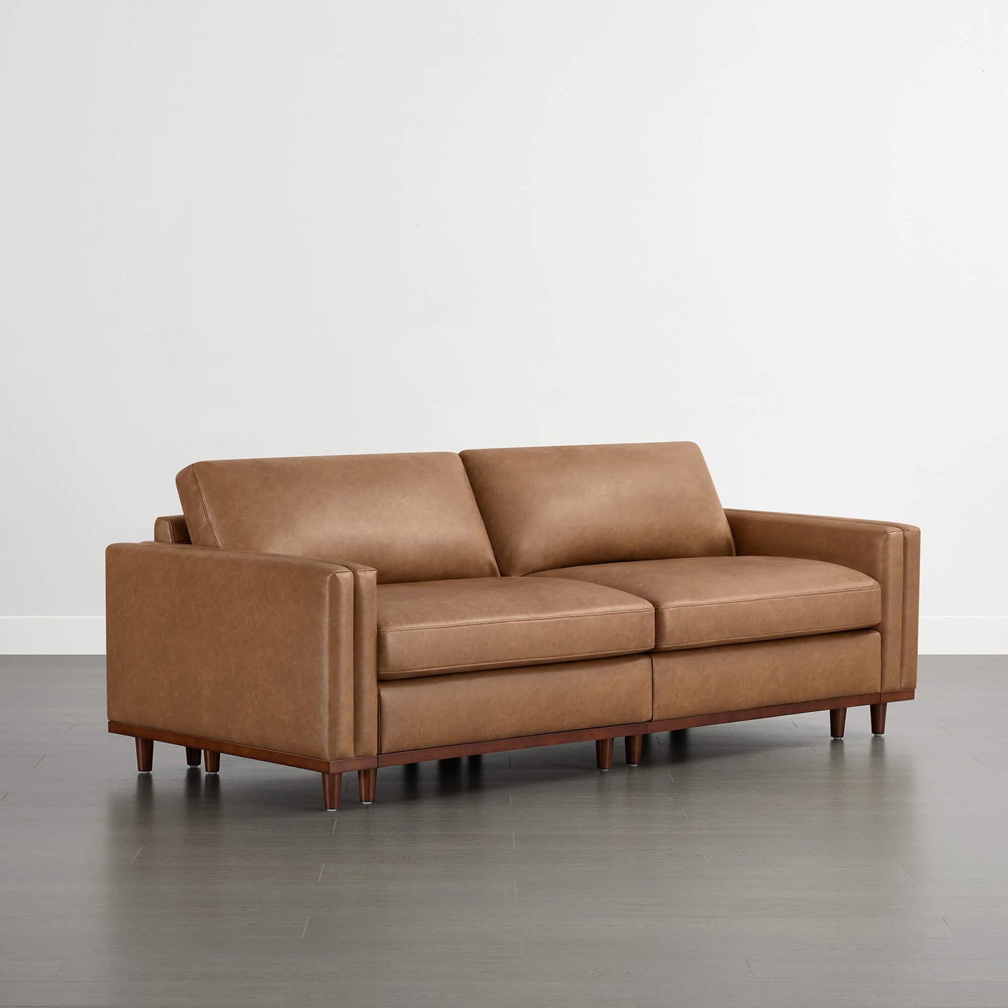 Overstuffed Feather Sectional Sofa with Wood Base