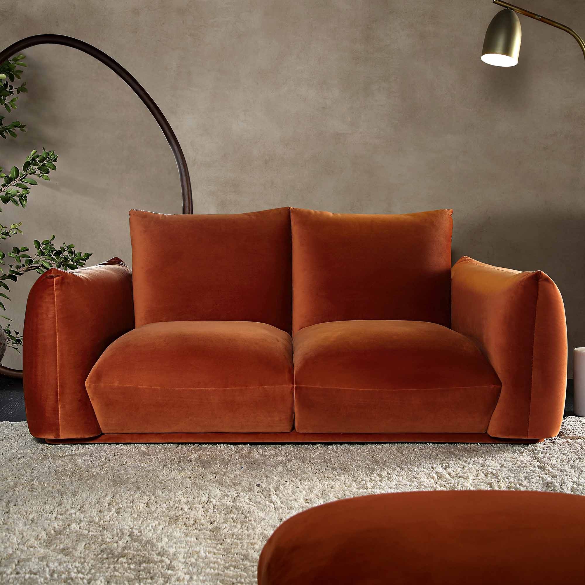 Two Seater Sofa in Rust Velvet with Sleek Armrests